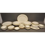 A Royal Worcester Viceroy Porcelain Dinner Service comprising soup bowls, plates, two covered