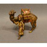 An Austrian Cold Painted Model in the Form of a Camel with Tradesmen, 7cm tall