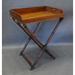 A Regency Mahogany Butler's Tray with folding stand