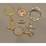 Two Paste Set Brooches, together with a paste set buckle, two gold plated pince nez and a locket