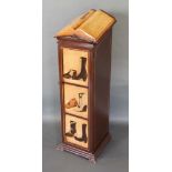 A Painted Lectern, the top in the form of an open book above a painted door raised upon shaped feet,