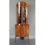An Edwardian Mahogany Marquetry Inlaid and Bow-Fronted Standing Corner Cabinet with an arched