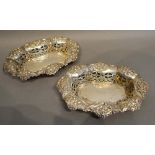A Pair of Sheffield Silver Pierced and Embossed Decorated Bonbon Dishes of oval shaped form,