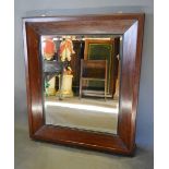 A Rectangular Mahogany Wall Mirror with bevelled glass plate, 101 x 87cm