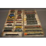 A Collection of Fleischmann Piccolo N Scale Rolling Stock within boxes, together with a small