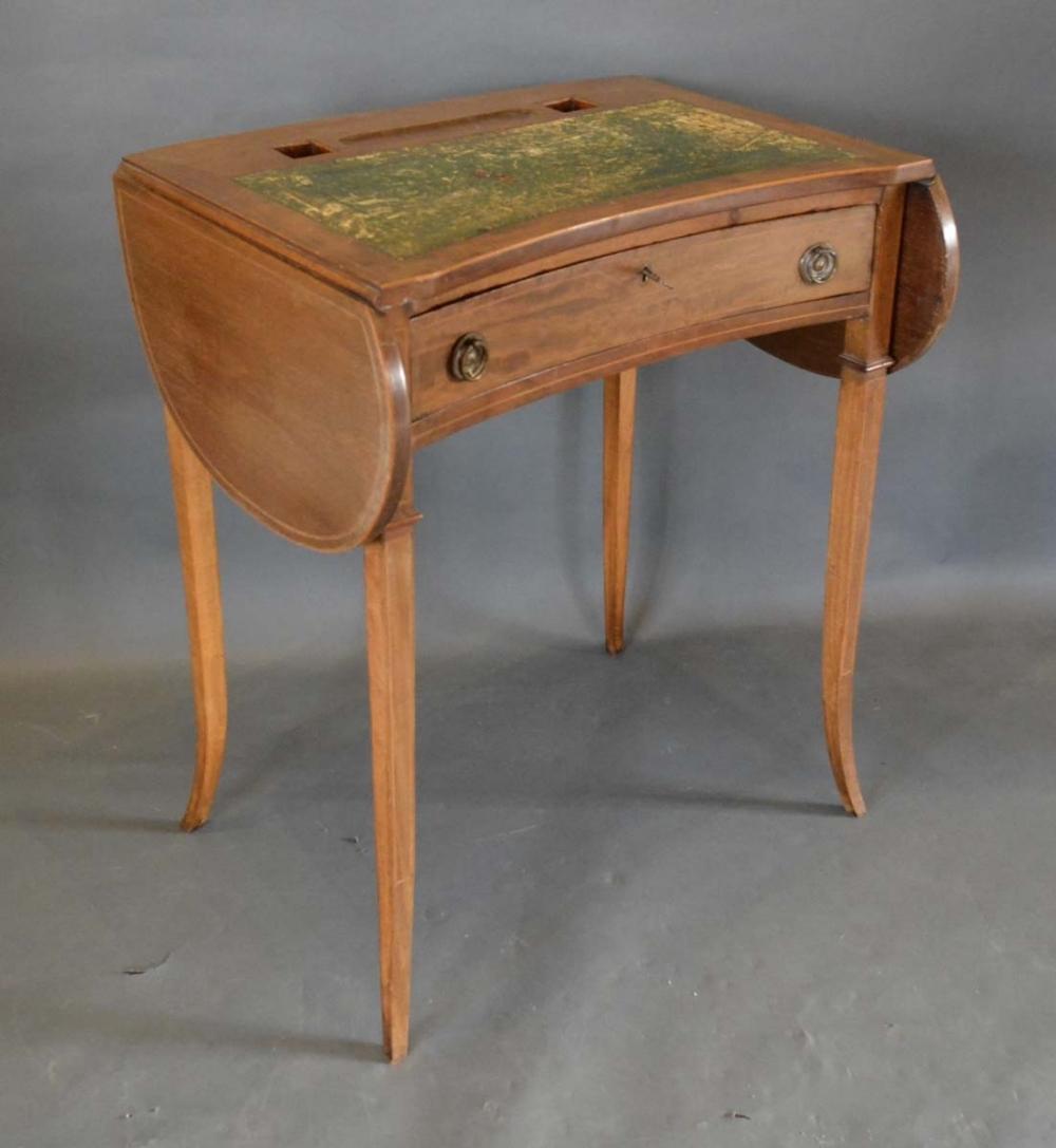 An Edwardian Mahogany Line Inlaid Kidney Shaped Writing Table, the tooled leather inset top above