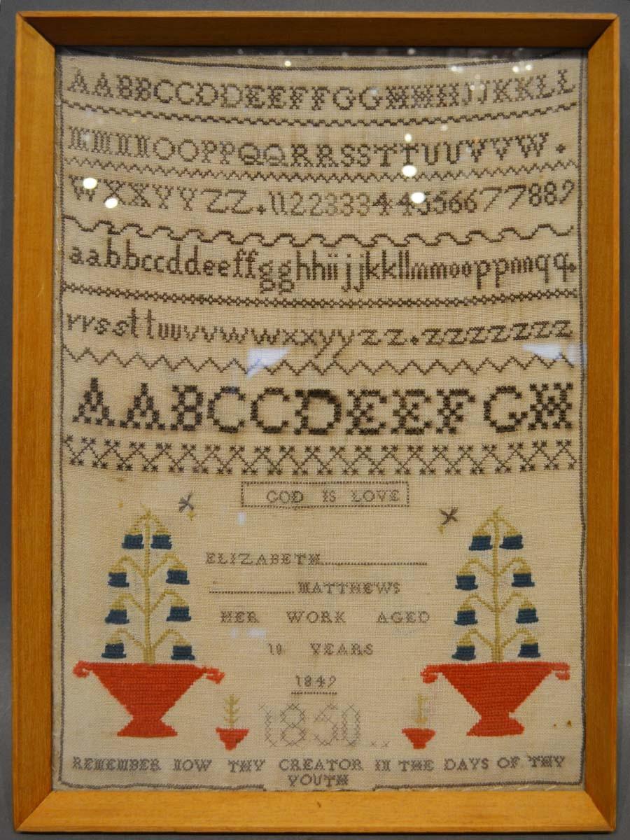 A 19th Century Woolwork Sampler by Elizabeth Matthews dated 1849, 40 x 30cm