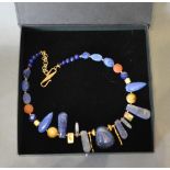 A Silver Necklace set with lapis lazuli by Maria Helena Spector