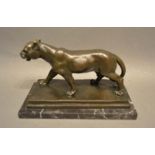 After Barrye, a Patinated Bronze Model in the Form of a Leopard upon variegated rectangular marble