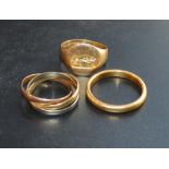 A 22 Carat Gold Wedding Band, 4.5 grammes, together with an 18 carat gold tri-colour ring, 3.4
