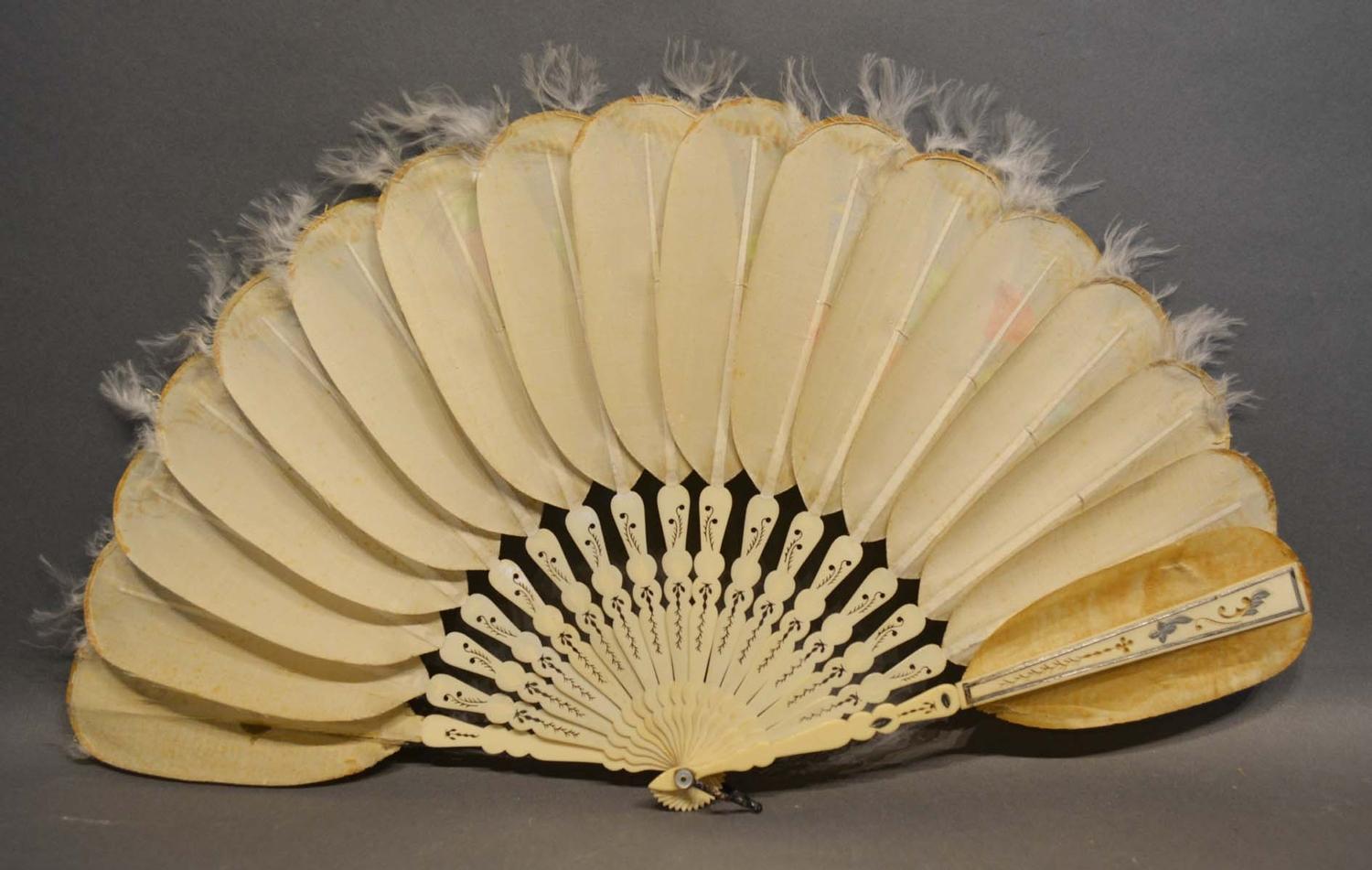 A Jenny Lind Fan, the silk feather style leaves hand painted with a peacock amongst foliage, the - Image 2 of 2