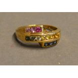 A 9 Carat Gold Cocktail Ring, set blue, pink and yellow stones