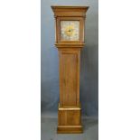 An Oak Longcase Clock, the square hood with half pilasters above a rectangular door on conforming