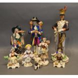 A Continental Porcelain Figure in the form of an Officer, together with other porcelain figures to