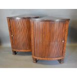 A Pair of 19th Century Mahogany and Marquetry Inlaid Corner Cabinets, each with a ribbed panel