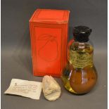Two Bottles Pear Williams with a pear, each with the original box and intact wax seal