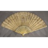 An Early 18th Century Paper Leaf Fan painted with bows and swags and mounted with sequins, the ivory