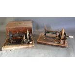 An Early Sewing Machine by Naumann, together with another similar sewing machine by Frister &