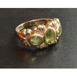 An 18 Carat Gold Ring set with three citrines
