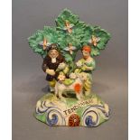 An Early 19th Century Pearlware Figure, Tenderness, marked on the reverse with the Walton scroll