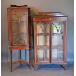 An Edwardian Mahogany Painted Two Door Display Case, together with an Edwardian mahogany standing