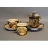 A French Porcelain Covered Chocolate Cup with stand, hand painted with summer flowers upon a dark