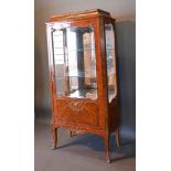 A French Kingwood Marquetry Inlaid and Gilt Metal Mounted Vitrine with a brass galleried top above a
