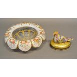 A Limoges Site Corot Oval Box mounted with a bird decorated in polychrome enamels and highlighted in
