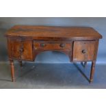 A George IV Mahogany Bow-Fronted Sideboard with a central drawer flanked by a door and a drawer,
