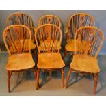 A Set of Six (4 plus 2) Early 19th Century Elm Windsor Dining Chairs, each with a pierced splat