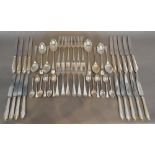 A London Silver Canteen of Cutlery comprising six dinner forks, six dessert forks, six tablespoons