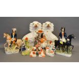 A Pair of Staffordshire Models of Spaniels, together with various other Staffordshire figures