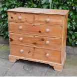 A Victorian Pine Straight front Chest of Drawers, the moulded top above two short and three long