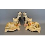 A Pair of 19th Century Staffordshire Models of Cats, each seated upon a cushion, 17cm tall, together