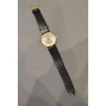 A 9 Carat Gold Cased Gentleman's Wristwatch by Eterna with leather strap
