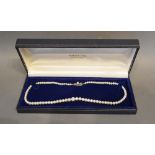 A Single Row Graduated Cultured Pearl Necklace by Mikimoto