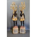 A Pair of 20th Century Floor Standing Blackamoor Candelabrum, each with six shaped branches above