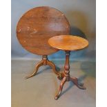 A George III Oak Pedestal Table, together with a 19th century mahogany pedestal table