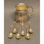 A Birmingham Silver Mug of bulbous form, together with a set of six sterling silver coffee spoons,