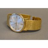 An Eterna Matic Centenaire 61 18 Carat Gold Cased gentleman's wristwatch with 18 carat gold strap,