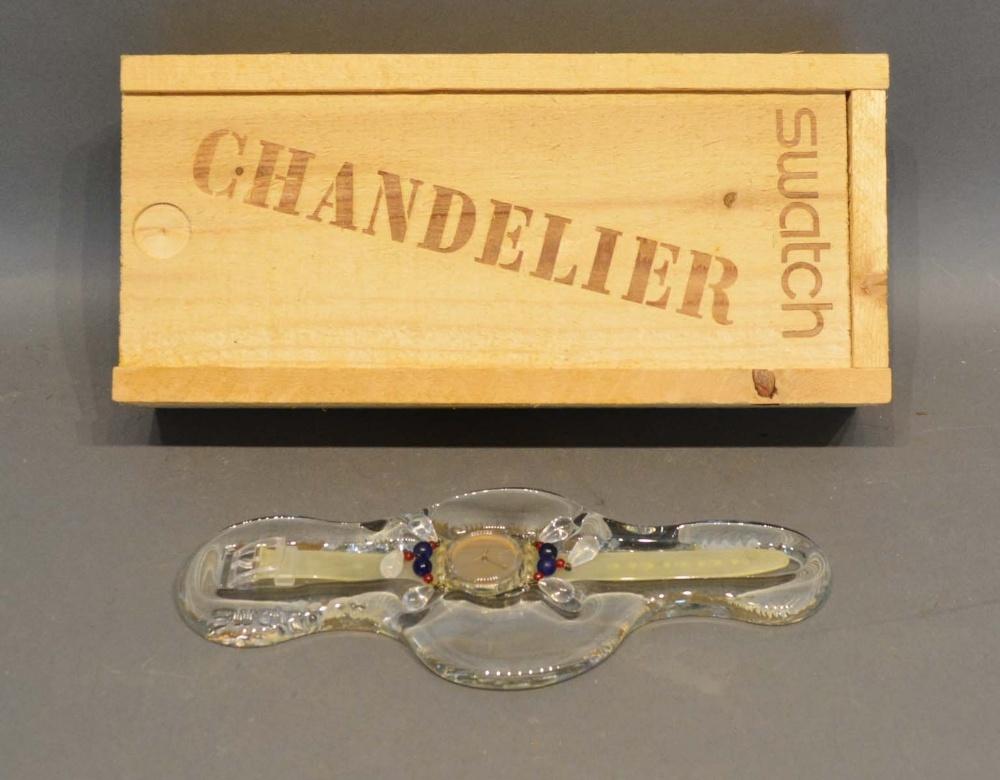A Swatch Chandelier Ladies Wristwatch with original box and stand