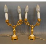 A Pair of French Ormolu and White Marble Two-Branch Candelabrum of figural form, 27cm tall