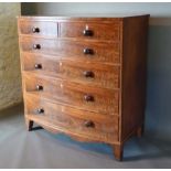 A 19th Century Mahogany Bow-Fronted Chest of two short and four long drawers with knob handles