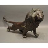 A Large Bronze Patinated Model in the Form of a Lion, 30 cm tall