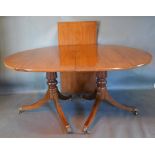 A Late 19th/Early 20th Century Regency Style Extending Dining Table, the line inlaid top above