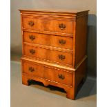 A 20th Century Mahogany Chest on Stand, the moulded top above four long drawers with brass handles