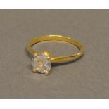 An 18 Carat Gold Solitaire Diamond Ring, the oval diamond claw set, approximately 1.03 carat