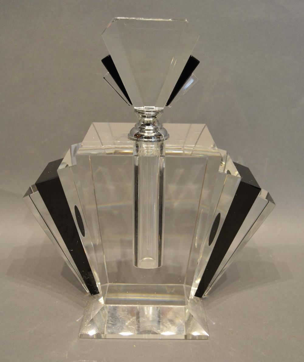 A Clear and Black Glass Scent Bottle of fan form with stopper, 24cm tall