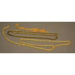 A 9 Carat Gold Linked Watch Chain, together with two other similar 9 carat gold chains, 19.4 grammes