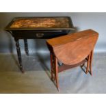 A Victorian Ebonised Writing table, the leather inset moulded top above a single drawer with brass